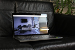 Laptop on sofa at the Sharp Project in Manchester